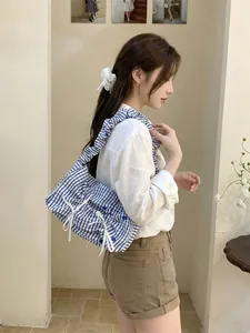 Korean style blue and white striped ruffled flap shoulder bag with bows for women