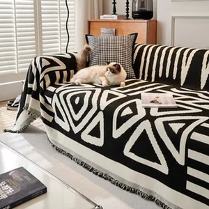 Bohemian black and white geometric chenille sofa throw blanket with fringe detail