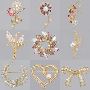 Collezione di spille di lusso scintillanti con strass e perle per abiti da sera