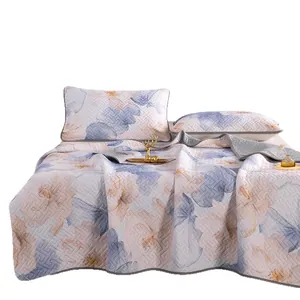 Elegant ice silk latex cooling mat 3-piece bedding set with blue floral quilted pattern