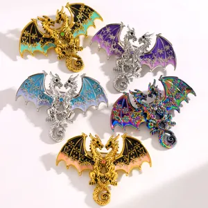 Detail of fantasy two-headed dragon brooches in various colorful snowflake designs.