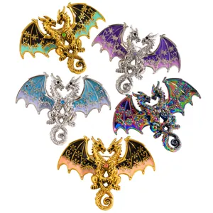 Detailed view of fantasy two-headed dragon brooches with intricate snowflake wing patterns