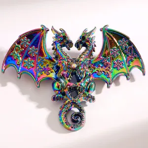 Close-up of fantasy double-headed dragon brooch with iridescent snowflake wings