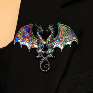 Detailed view of a fantasy rainbow double-headed dragon brooch on a black coat lapel.