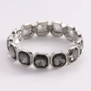 Detailed macro view of an elegant black faceted crystal bracelet in silver metal frames