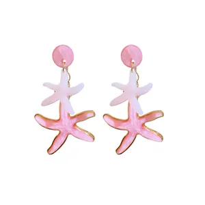 Pendientes colgantes de estrella de mar en resina rosa y blanca, estilo playa.