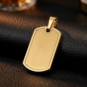 Macro detail of golden stainless steel dog tag pendant with brushed sand finish