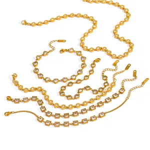 Detailed view of gold-plated stainless steel jewelry set with sparkling zircons