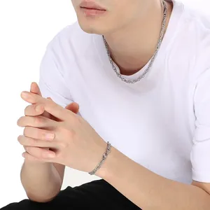 Detailed view of unisex stainless steel twisted rope chain necklace and bracelet set