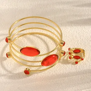 French style spiral jewelry set with red gems including bracelet and ring
