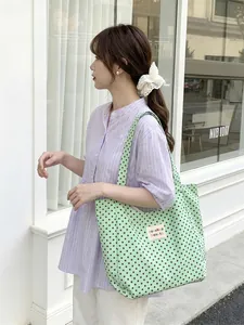 Green polka dot canvas tote bag with large capacity for women's commute and school