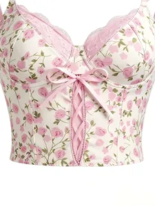 Detailed view of a vintage milk silk corset top featuring pink rose floral patterns and lace