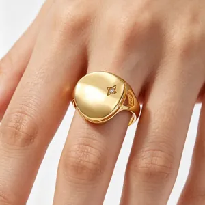 Elegant S925 sterling silver gold plated round signet ring with a small star detail