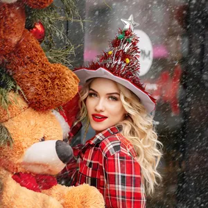 Festive red tinsel Christmas tree hat with silver star topper for holiday party decor