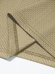 Close-up detail of the hem and waffle texture on a men's summer ice-feel Polo shirt