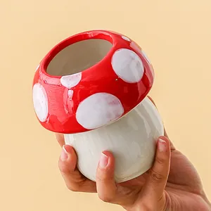 Cute handmade red and white ceramic mushroom pen holder and makeup brush organizer