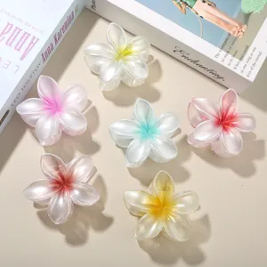 Set of six colorful frangipani flower hair claw clips with elegant gradient finish