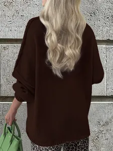 Detailed back view of a cozy dark brown oversized knit sweater for women in autumn