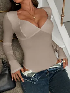 Close-up of a taupe V-neck long-sleeve bodysuit with a trendy sexy Y2K street style look