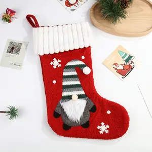 Festive large red Christmas stocking featuring a cute 3D gnome and snowflake embroidery