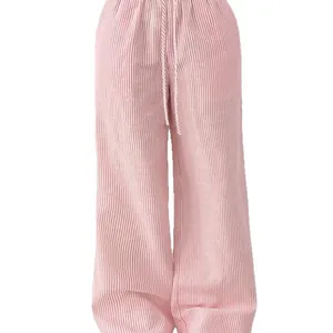 Fashionable women's pink and white vertical striped wide-leg pants with drawstring waist.