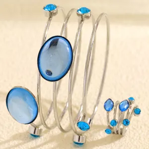 French style geometric wrapped wire bracelet and ring set with blue faceted gemstones