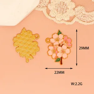 Detailed view of a cherry blossom enamel charm with 29x22mm size and 2.2g weight.