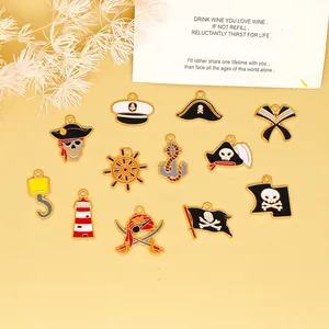 Detail showing various pirate themed enamel alloy pendants for DIY jewelry making.
