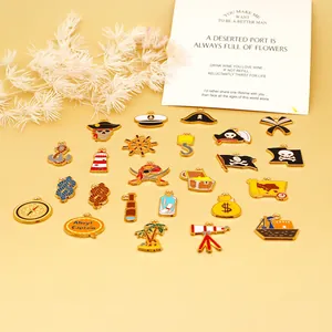 Close-up of mixed pirate and ocean themed enamel alloy charms for DIY jewelry making