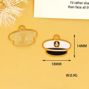 Detailed close-up view of nautical captain hat charms showing dimensions and textures