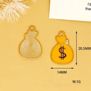 Close-up of yellow dollar sign money bag alloy charms showing 20.5x14mm size and 1g weight
