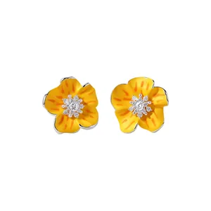 Elegant yellow floral enamel stud earrings with shimmering central zircon stones.
