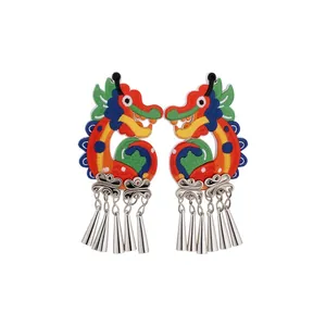 Ethnic style embroidered dragon ear clips with silver-colored cone tassels