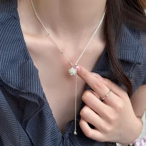Korean minimalist silver popcorn pendant necklace worn by a woman for an elegant look