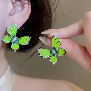 Forest style green enamel butterfly stud earrings with sparkling rhinestones for women