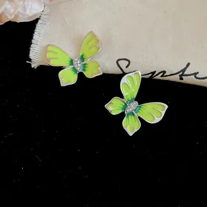 Elegant green enamel butterfly stud earrings with sparkling rhinestones for women