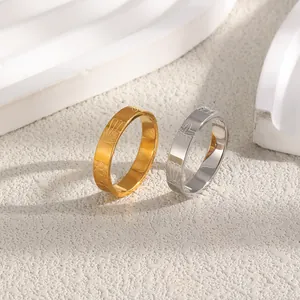 Macro view of stainless steel rings featuring engraved starfish and shell ocean patterns