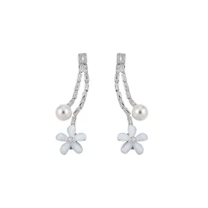 Elegant silver drop earrings with blue enamel flowers, pearls and sparkling zirconia stones.