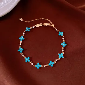 18k gold plated bracelet with turquoise flower motifs and sparkling zircon accents