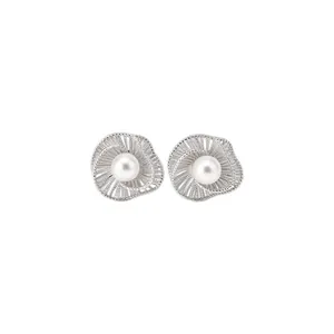Elegant French style silver hollow flower pearl stud earrings for women's daily wear