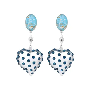 Exquisite silver needle resin heart drop earrings with blue rhinestones in a light luxury style