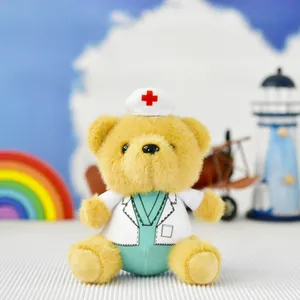 Close-up of a plush doctor teddy bear toy wearing a white medical lab coat and hat