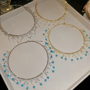 Collection of vintage crystal lace chokers in gold and silver finish with blue beads