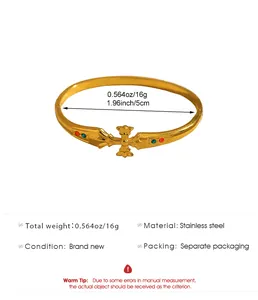 Macro view of gold stainless steel cross bangle showing 5cm diameter and 16g weight info