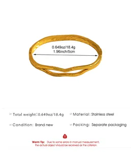 Detailed view of gold bohemian stainless steel bangle with size and weight specs