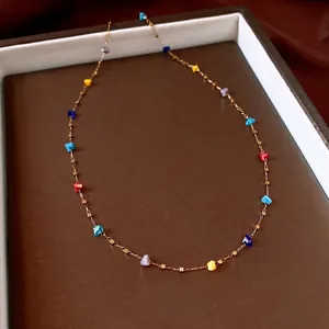 Elegant gold chain necklace featuring colorful irregular crystal beads for women.