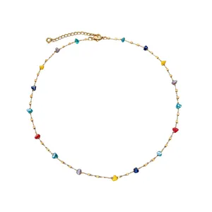 Dainty gold chain necklace featuring colorful irregular crystal beads and square accents