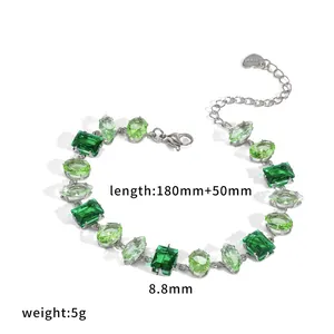 Elegant stainless steel bracelet featuring mixed green zircon stones and adjustable chain