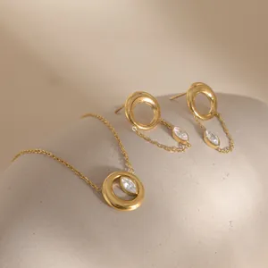 Detailed view of 18k gold plated stainless steel necklace and earring set with stones