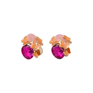 Vintage butterfly stud earrings with fuchsia crystal and pink beads on white background